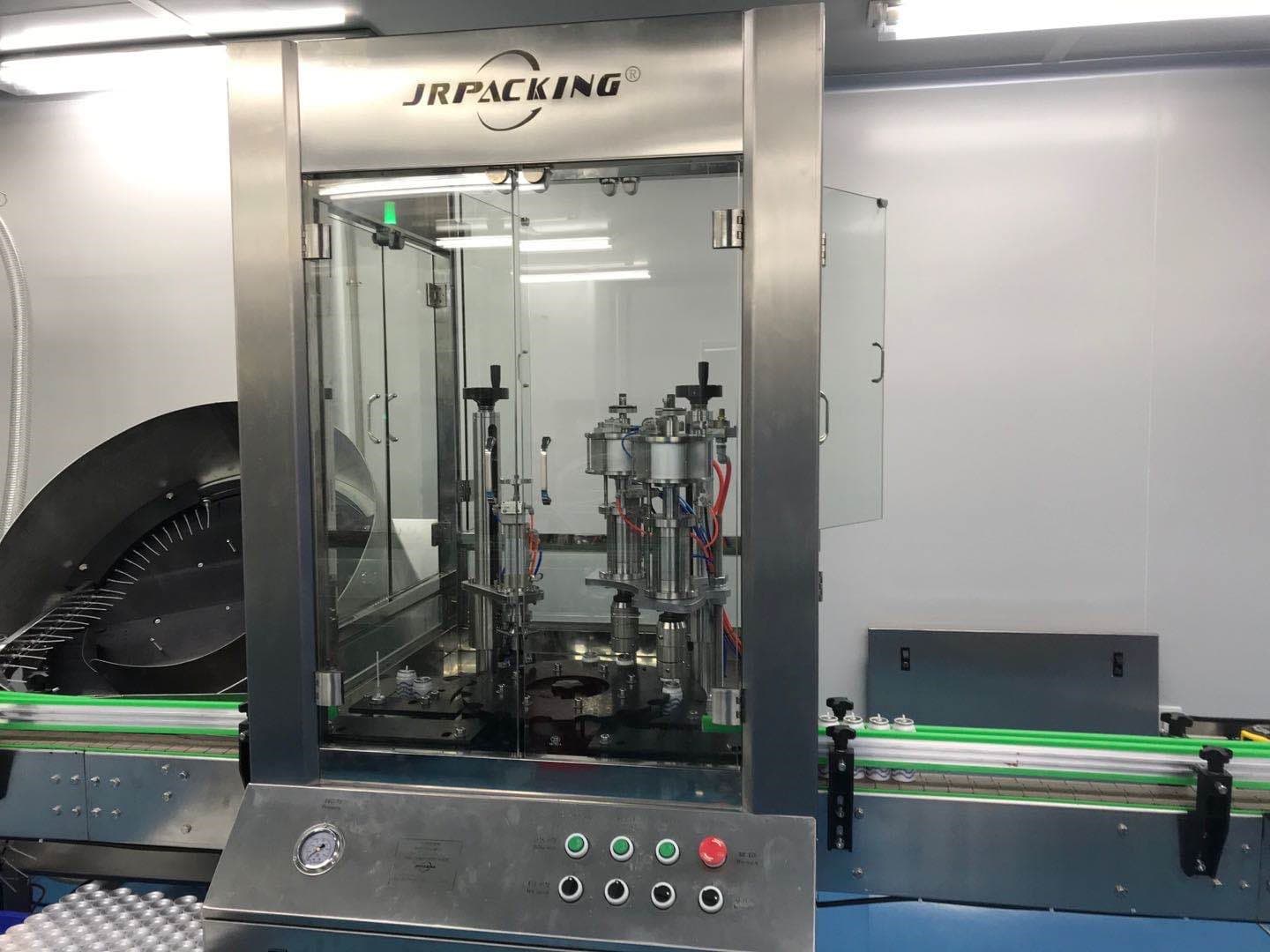 Автоматическая линия для наполнения аэрозольных баллонов - изображение 5, Устройство опускания клапана с корректировкой