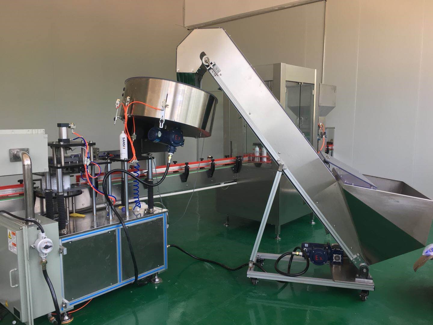 Автоматическая линия для наполнения аэрозольных баллонов - изображение 7, Автоматическое нанесение внешней крышки