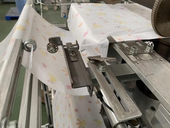 Оборудование для производства нарукавников из нетканого материала - изображение 5, детальный вид оборудования