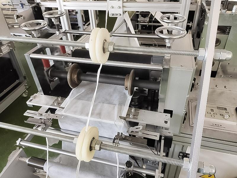 Автоматическое оборудование для производства бахил из нетканого материала - изображение 7, детальный вид оборудования