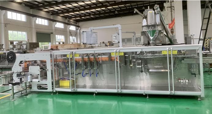 Автоматическая линия для фасовки в пакеты дой-пак (с производством пакетов на линии) - изображение 1, детальный вид оборудования